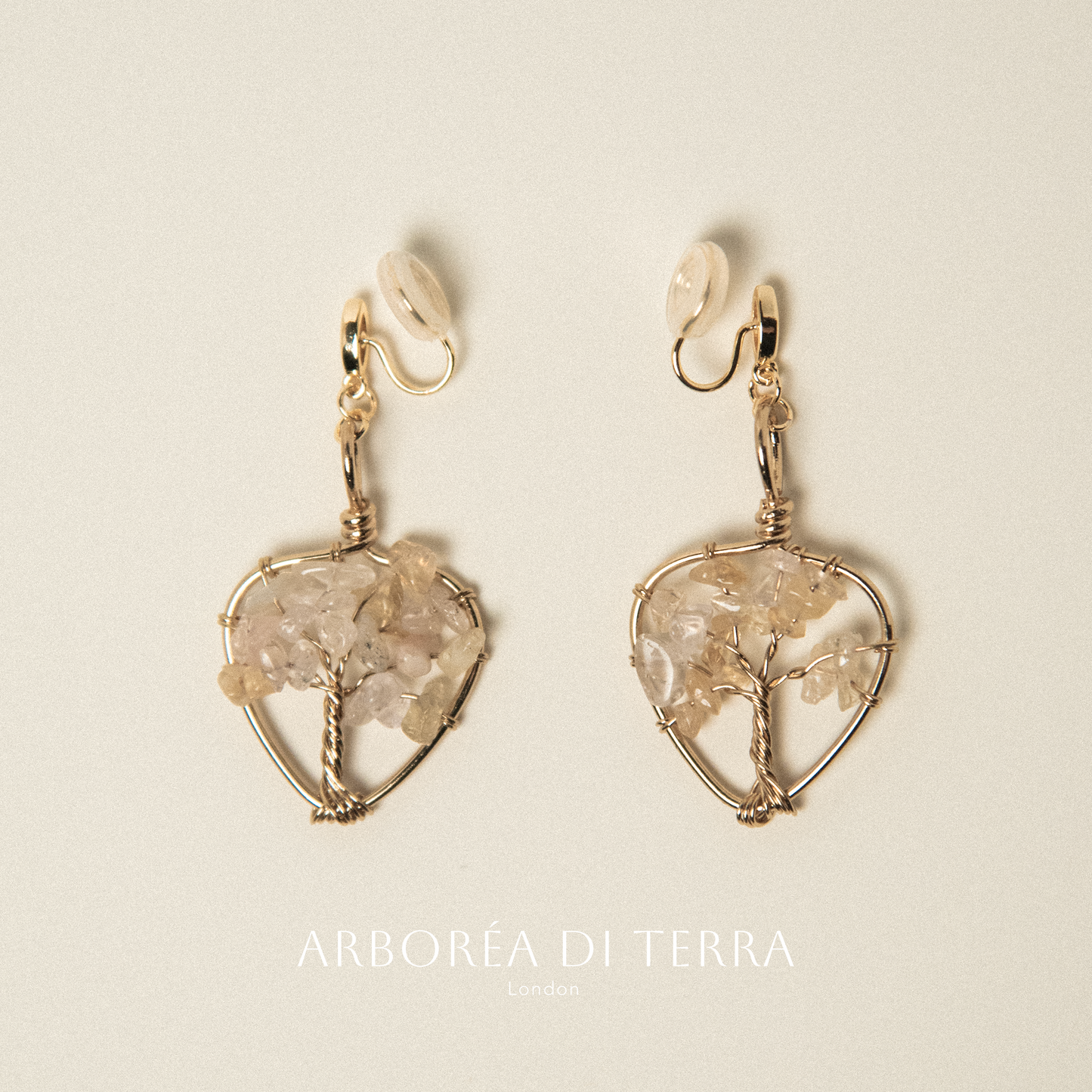 Earrings with natural cream stone clips