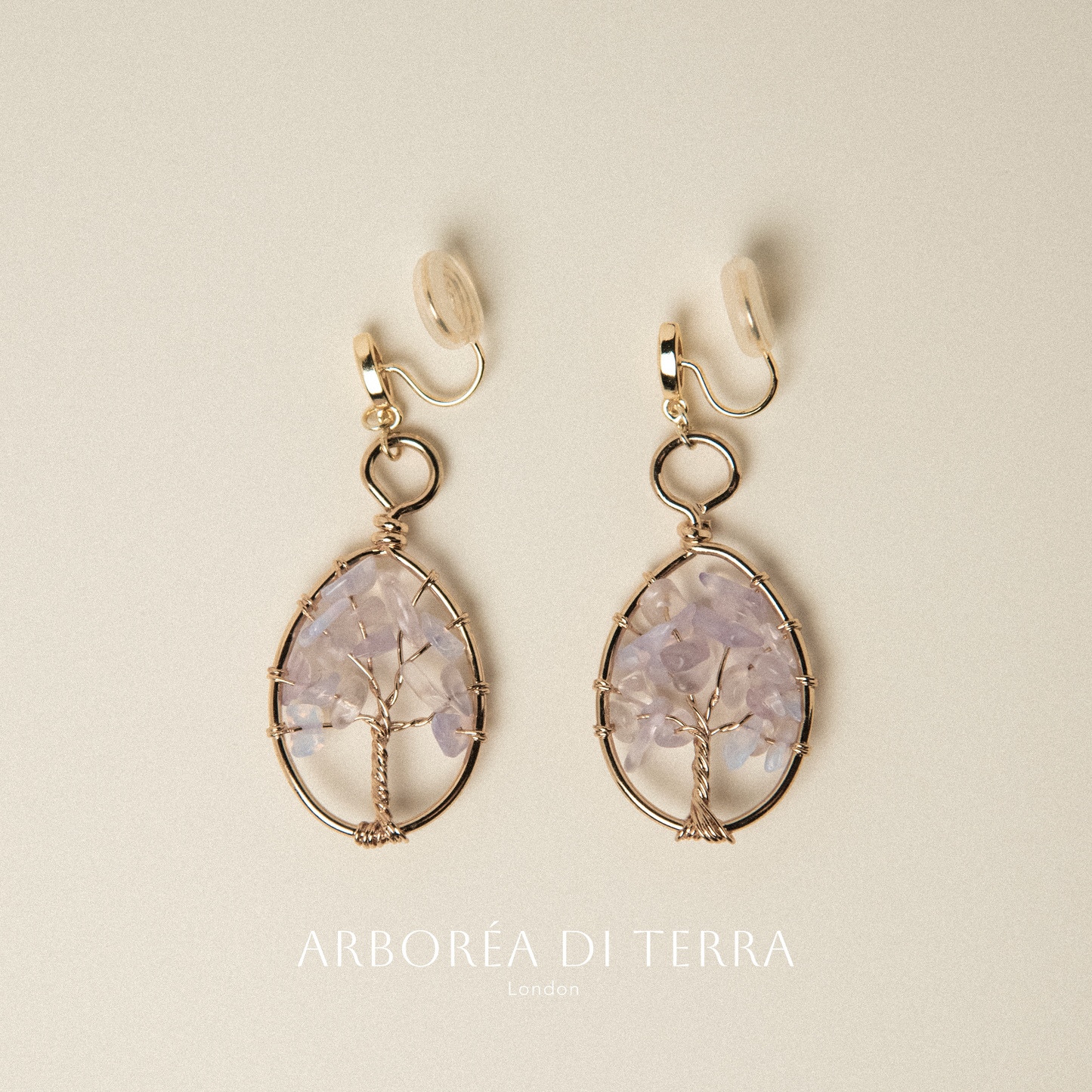 Earring with purple natural stones